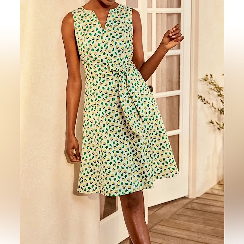Biden, size 6, fit and flare dress with belt/tie at waist, bright lemon print